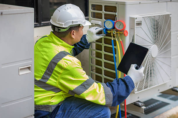 Professional Heat Pump Repair technician working in New Freeport, PA